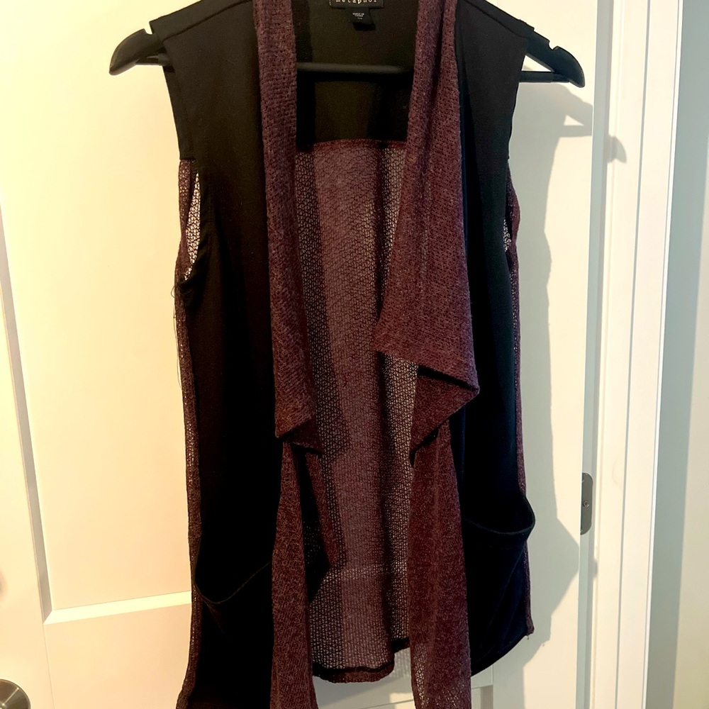Open front, purple and black vest.  Metaphor brand. Small. Excellent condition.